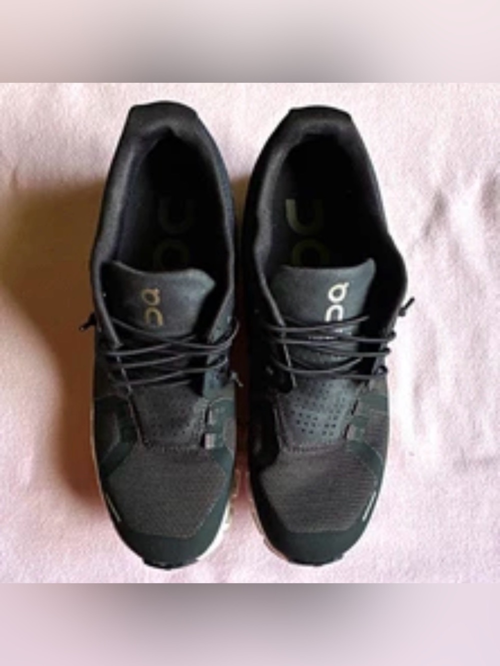 On Running Women’s Black Athletic Sneakers with Subtle Silver Logo